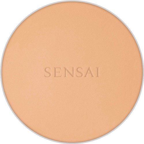 A round compact with beige powder inside and the word "SENSAI" embossed.