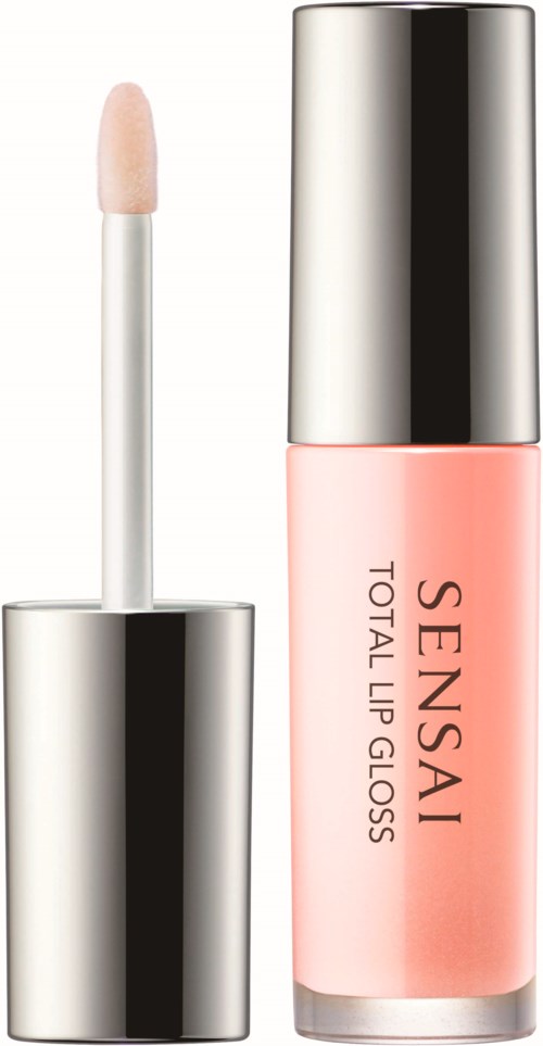 Eine kleine Tube Lippen gloss mit rosa Farbe und silberner Kappe. Das Etikett sagt "SENSASI TOTAL LIP GLOSS."