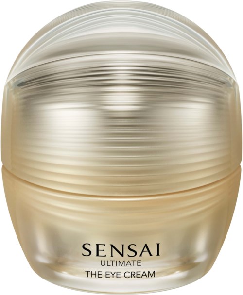 Ein goldfarbener, runder Behälter mit dem Label Sensai Ultimate Eye Cream, mit glänzender Oberfläche und elegantem Design.