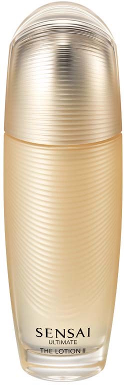 Eine lange, beige Flasche mit goldener Kappe, beschriftet "Sensai Ultimate The Lotion II."