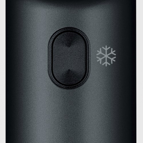 En svart hudpleiebeholder med oval form og en snøfnuggsymbol foran.