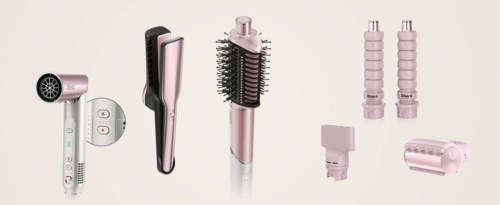 A collection of pink and white hair styling tools and attachments, including a hairdryer, curling iron, and various rollers.