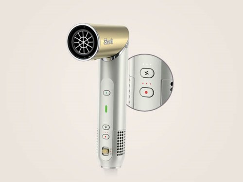 Handheld device with a circular head, buttons, and a small display, used for hair drying or styling.