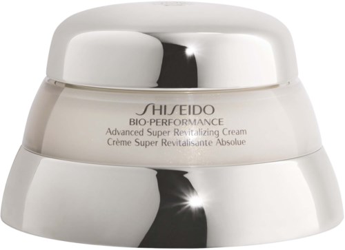 Een witte pot met het label Shiseido Bio-Performance crème, met een glanzende zilveren deksel, lijkt luxe en hoogwaardig.