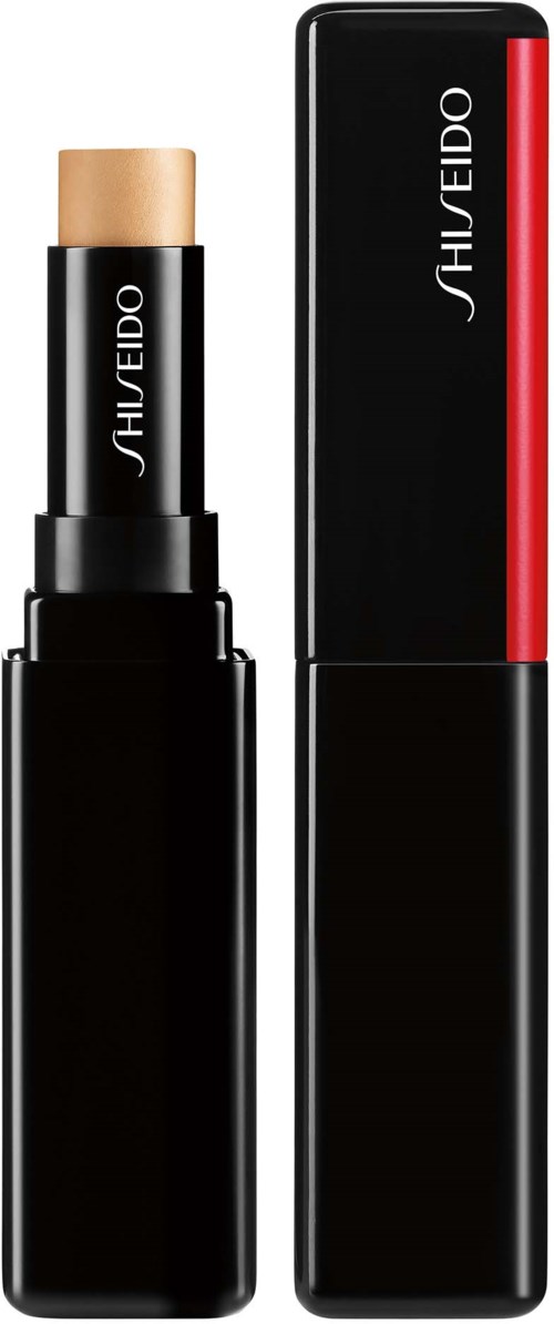 Svart läppstiftsfodral med en beige läppstift som är delvis öppnad. Shiseido-märke på förpackningen.
