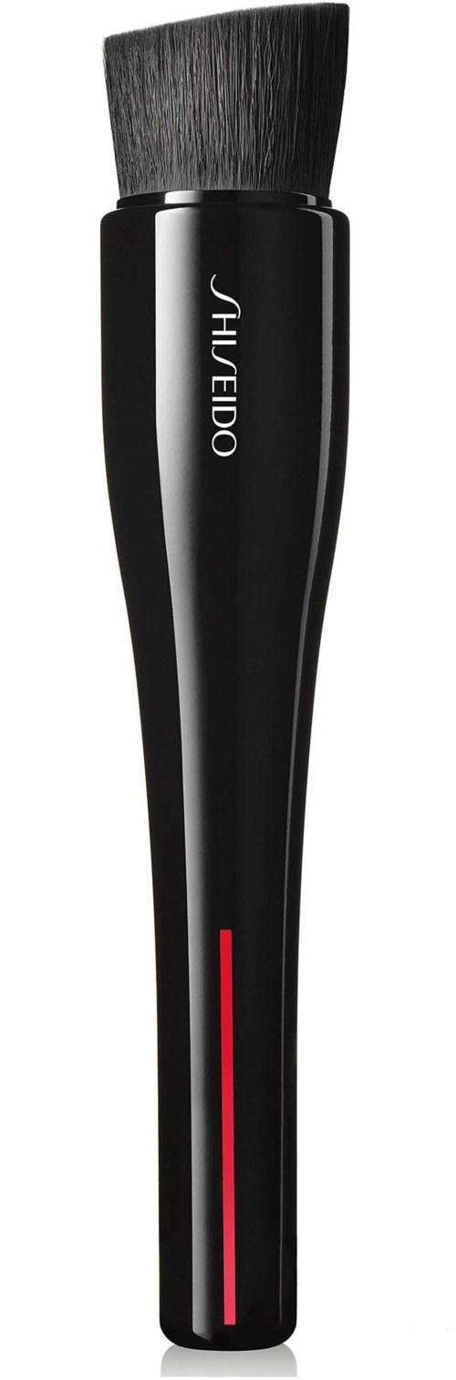 A black makeup brush with a thick handle and soft bristles. The handle has a red line near the bottom. JH EIDO is written on it.