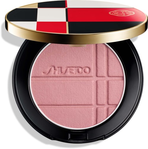 Rosa rouge-rouge i kompakt med fyra kvadranter och Shiseido-logotyp imprinted inuti.