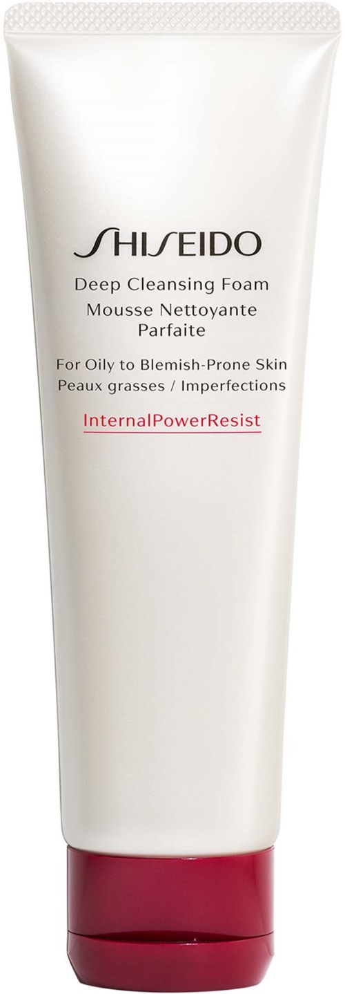 A white tube of facial cleansing foam with red cap, labeled for oily, acne-prone skin, by Shiseido.