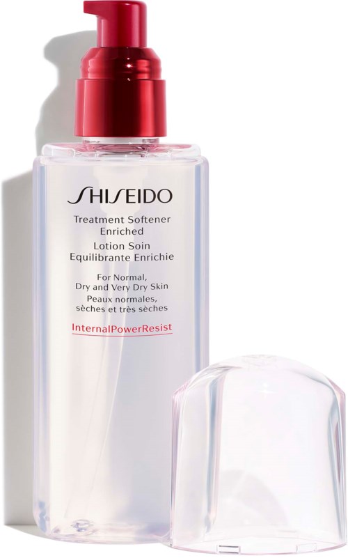 Przezroczysta butelka z odżywką Shiseido z czerwoną pompką i zakrętką. Etykieta zawiera szczegóły produktu.
