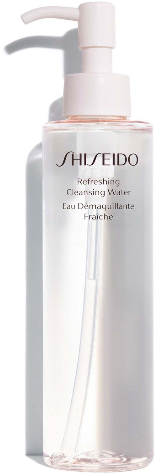 A clear bottle with a pump, labeled Shiseido Refreshing Cleansing Water, used for washing the face.