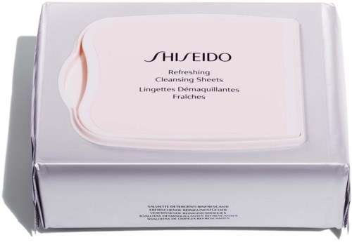 A box of Shiseido refreshing cleansing sheets, pink and white color, placed on a shiny silver surface.