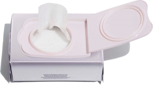 A pink and white plastic box with a lid and a small cloth attached, used to remove makeup or dirt.