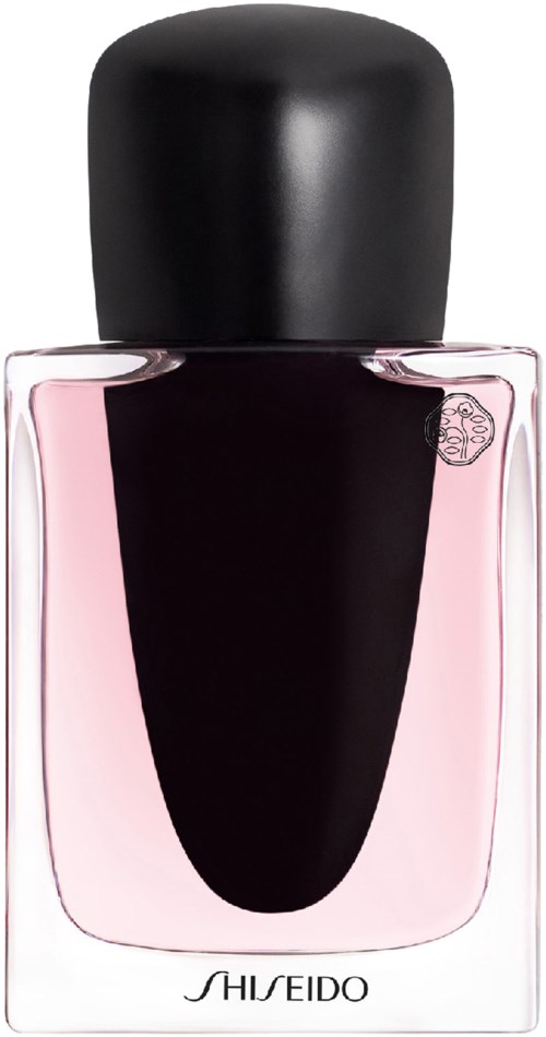 Shiseido-hajuvesipullo, jossa vaaleanpunaista nestettä ja musta, yksinkertainen ja tyylikäs design.