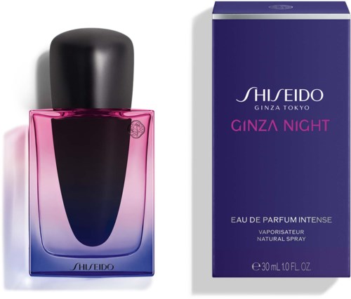 En rosa och lila parfymflaska med svart topp bredvid en blå förpackning märkt 'Ginza Night' av Shiseido.
