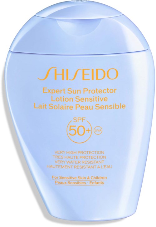 A light blue bottle of Shiseido sun lotion with SPF 50+, designed for sensitive skin and children.