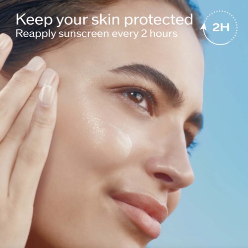 A woman applies sunscreen to her face, with text advising to reapply sunscreen every two hours.