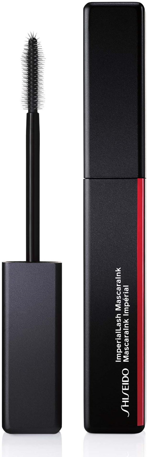 En mascara-borste med svart handtag och ett rör märkt 'Shiseido' står upprätt bredvid varandra.