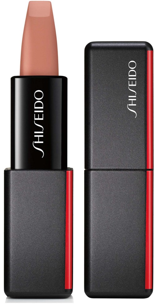 En läppstift i beige nyans i ett svart fodral, och ett matchande svart fodral med röda detaljer, båda märkta SHISEIDO.