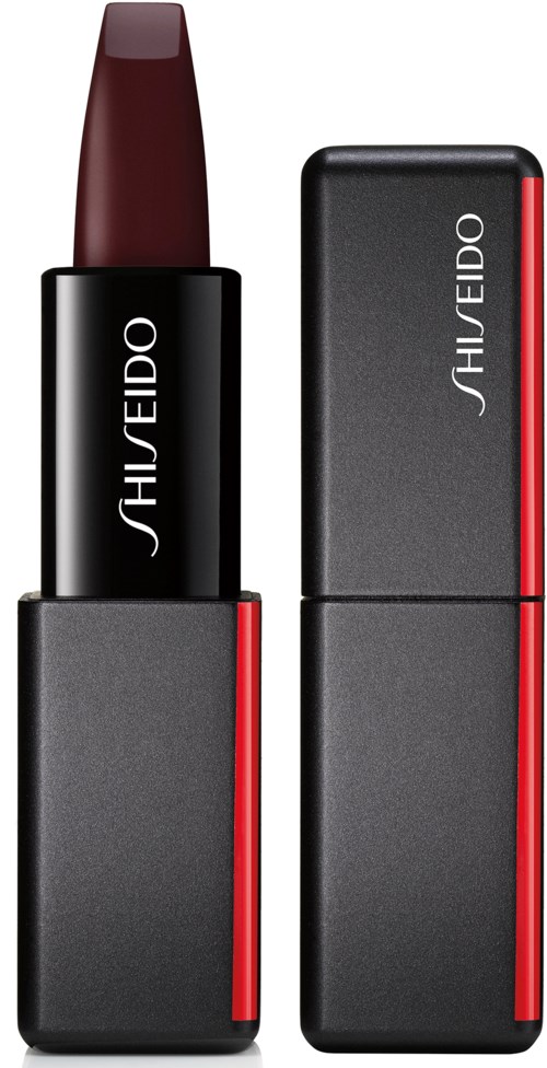 En läppstift med ett svart och rött fodral, läppstiftet är djuprött. Märket "Shiseido" syns.