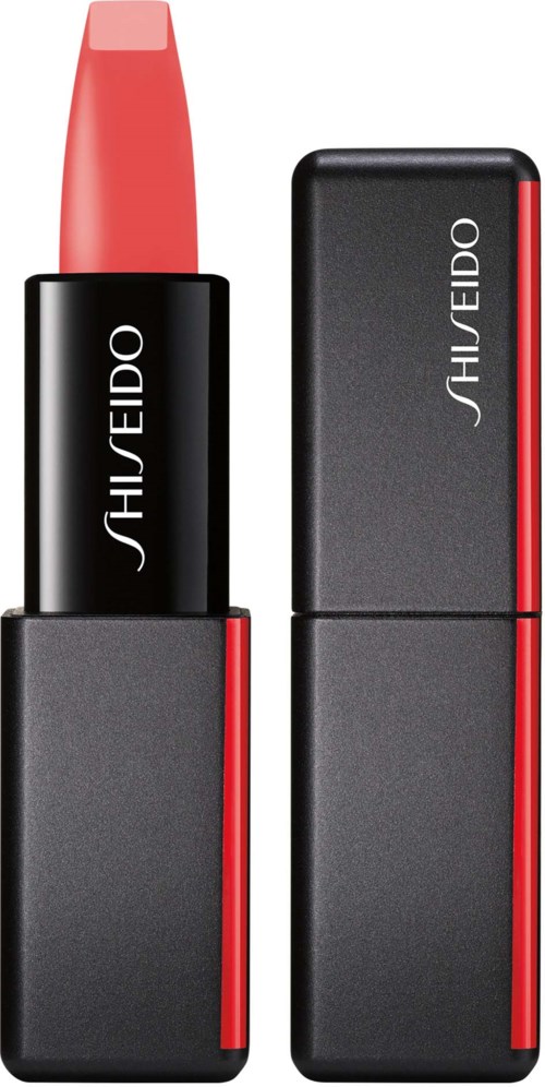 Läppstift i svart och röd förpackning, läppstiftet är rosa. Förpackningen har varumärket Shiseido på sig.