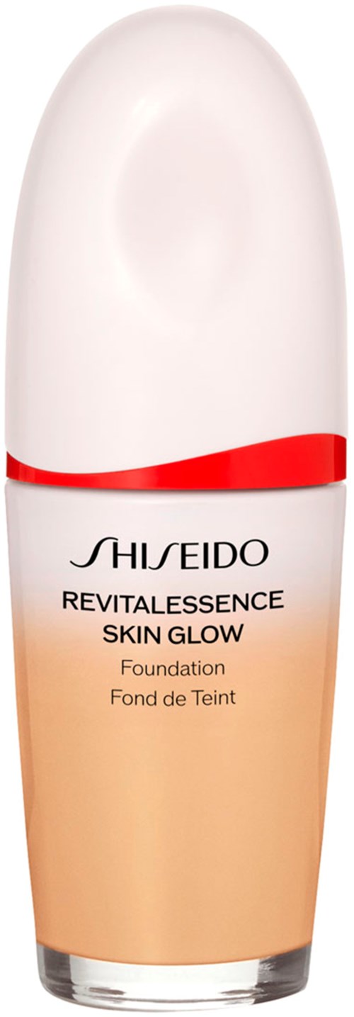 Shiseido Revitalessence Skin Glow foundation med vit flaska och en röd linje.