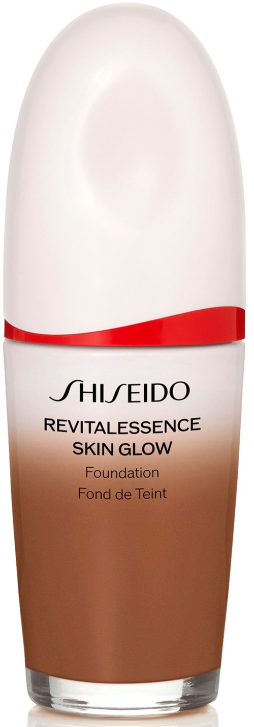 A bottle of Shiseido Revitalessence Skin Glow foundation with a white cap and a brown body.