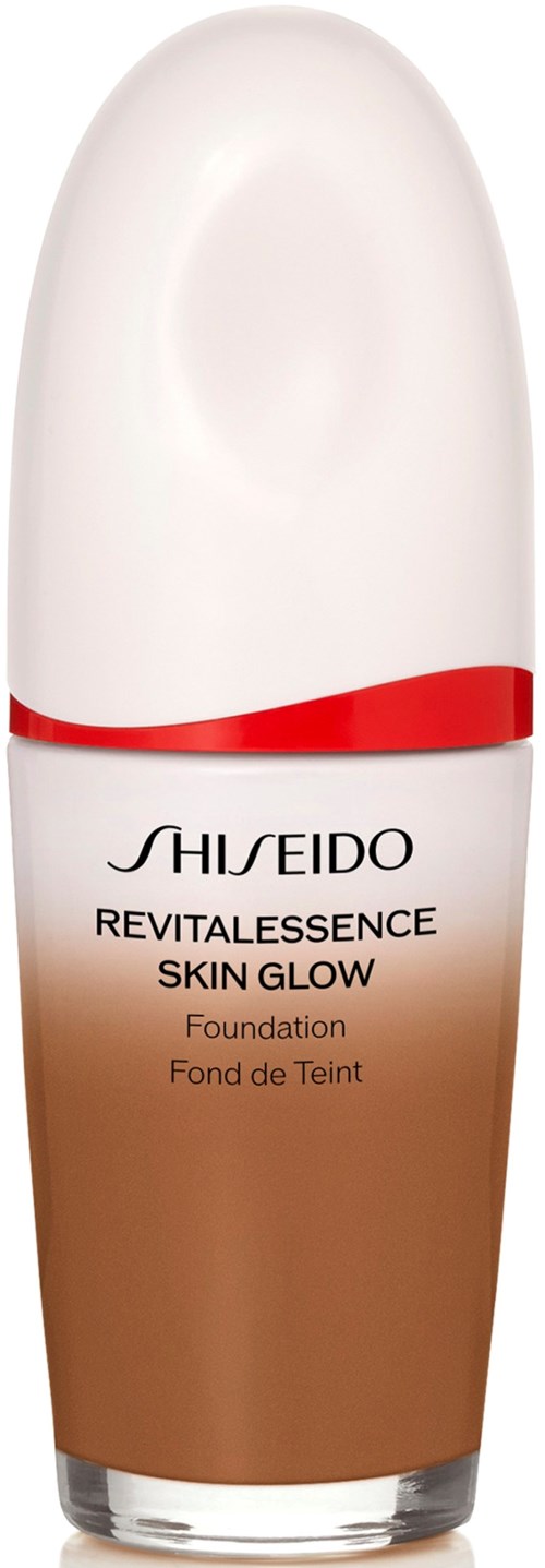 A foundation bottle with a white cap, brown liquid, and Shiseido Revitalessence Skin Glow label.