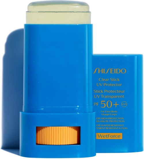 Sininen aurinkovoideliusu, jossa keltainen yläosa, merkinnät 'Shiseido' ja 'SPF 50+' kasvoille ja vartalolle.