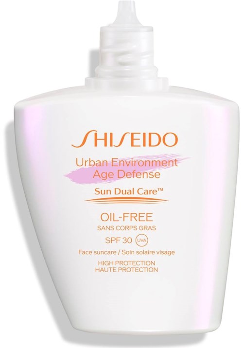 En vit solkrämflaska med rosa och orange text, märkt som oljefri med SPF 30 och solskydd.