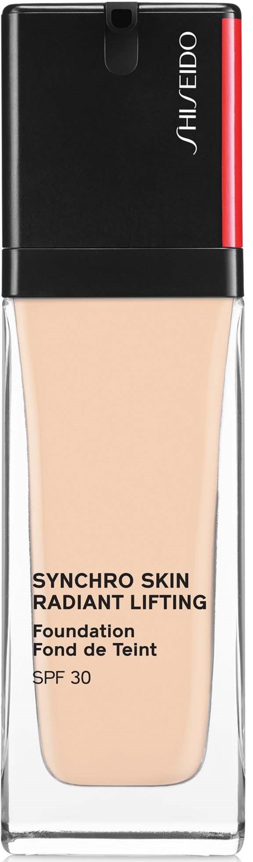 Tölkin pullo, jossa musta korkki, vaaleankeltainen neste ja teksti, joka kertoo sen olevan Shiseido Synchro Skin Radiant Lifting.