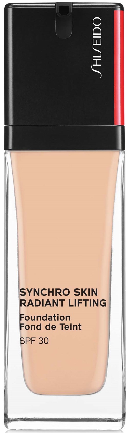Nestemäinen meikkivoide kirkkaassa pullossa, jossa musta ja punainen korkki, Shiseido-merkkinen "Synchro Skin Radiant Lifting".