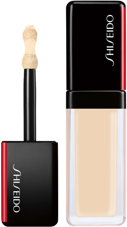 En foundationflaska och applikator från Shiseido med svart, rött och genomskinligt design och beige flytande makeup.