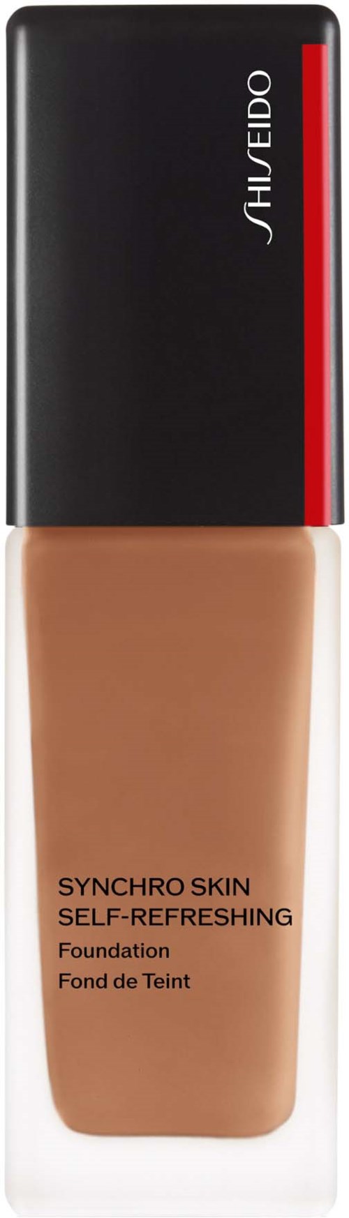 En foundationflaska med svart, rött och genomskinligt delar. Produkten heter "Synchro Skin Self-Refreshing" av Shiseido.