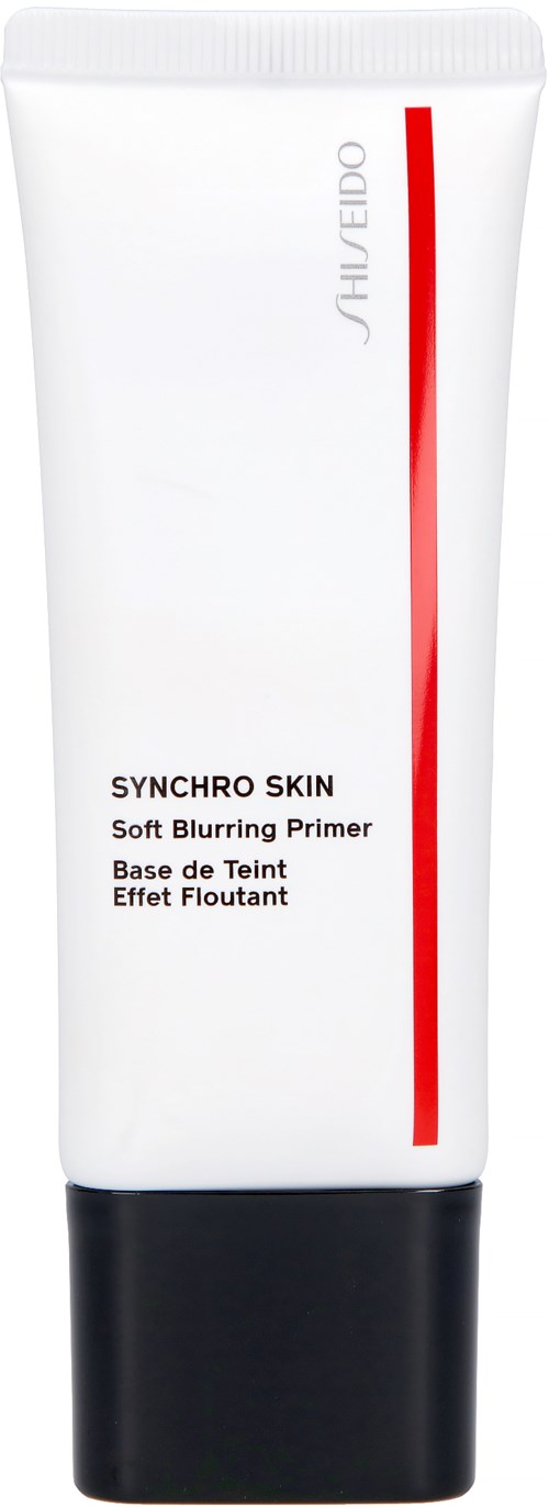 Een witte tube met zwarte onderkant, rode lijn en tekst over Shiseido's Synchro Skin primer. Het lijkt schoon en eenvoudig.