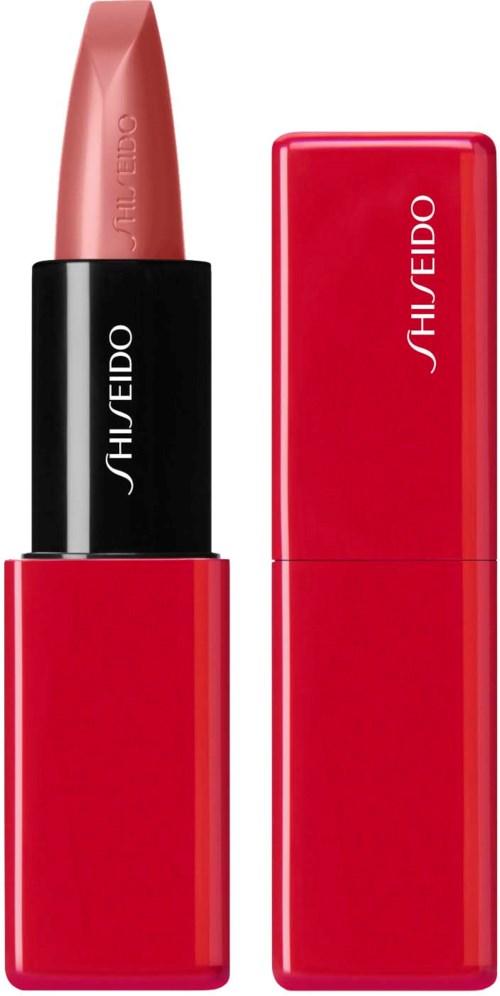 A red lipstick with a black band and white text, next to a matching red rectangular case.