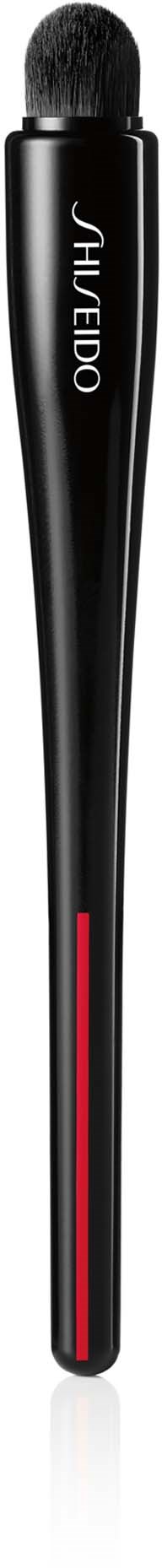 A black makeup brush with a red stripe near the bottom and the brand name HUH FIBO on the handle.