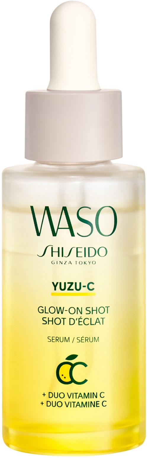 En gul serumflaska med vit pipettlock, märkt WASO YUZU-C, av Shiseido, som främjar ljusare hud och vitamin C.