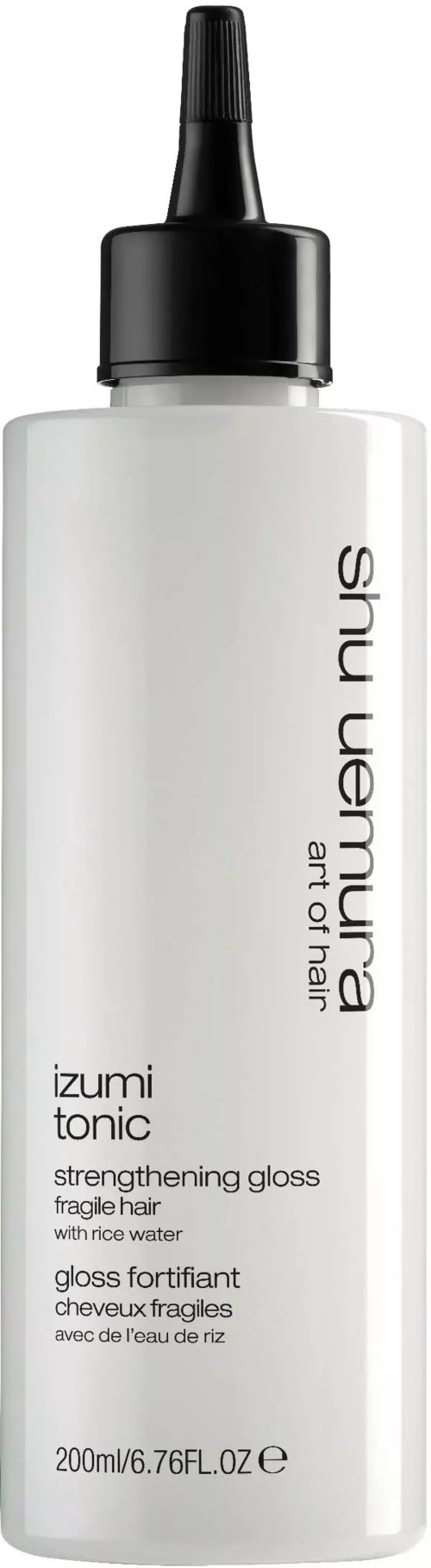 Eine weiße Flasche mit schwarzem Deckel, beschriftet Shu Uemura Izumi tonic für Haarglättung, 200ml.