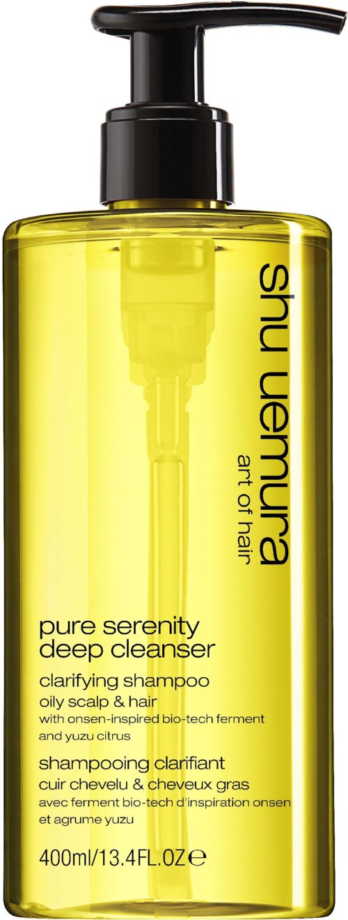 Gelbe Flasche mit schwarzem Pumpkopf, beschriftet 'shu uemura'. Enthält 'pure serenity deep cleanser' für Haare und Kopfhaut. 400 ml.