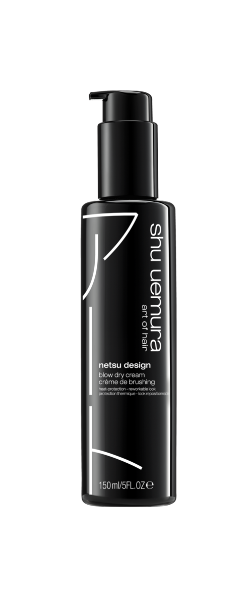 Eine schwarze Flasche mit Pumpkopf, beschriftet 'n netsu design' und 'sun nurturing'.