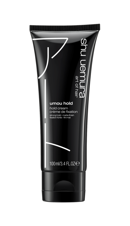Eine schwarze Tube Shu Uemura Umou Hold Haarkreme für starken Halt und matter Oberfläche, 100 ml. Stilvolles Design mit weißen Text.
