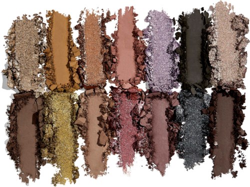 A row of crushed eyeshadow powders in various colors, including browns, golds, pinks, purples, black, and gray.