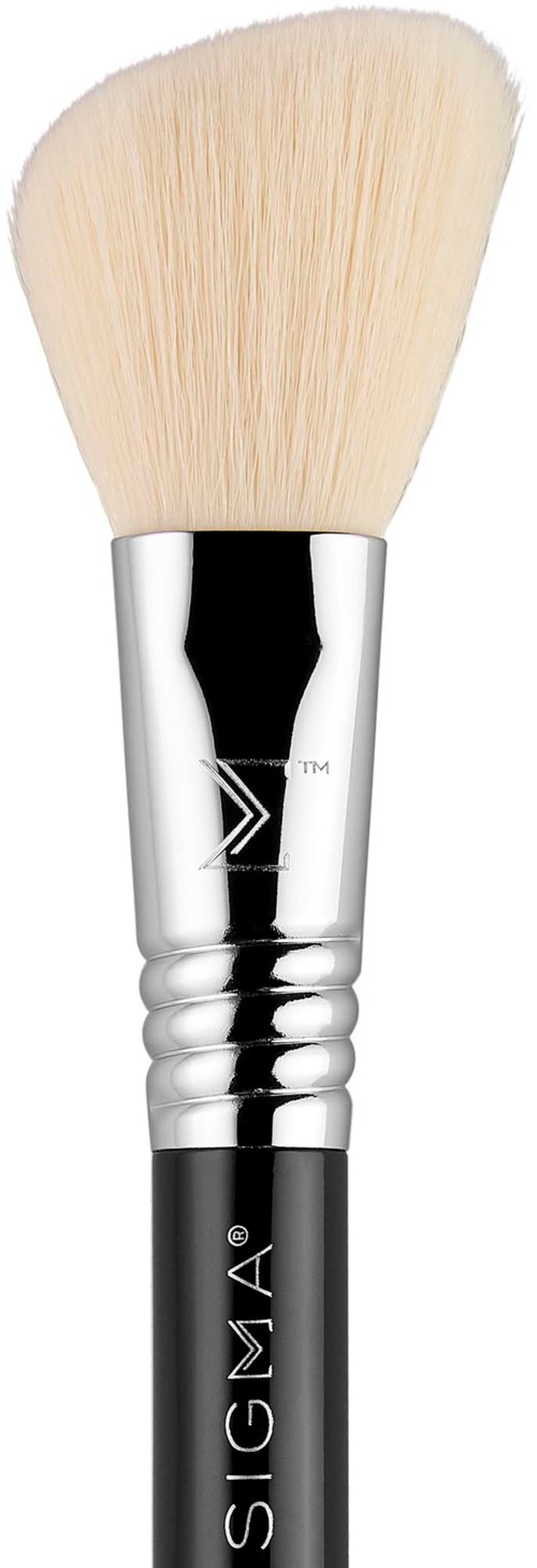 A makeup brush with white bristles and a silver handle, used for applying powder or blush.