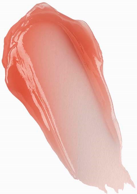 En smet av persikofärgad makeup med en glänsande, slät textur och ljus gradient.
