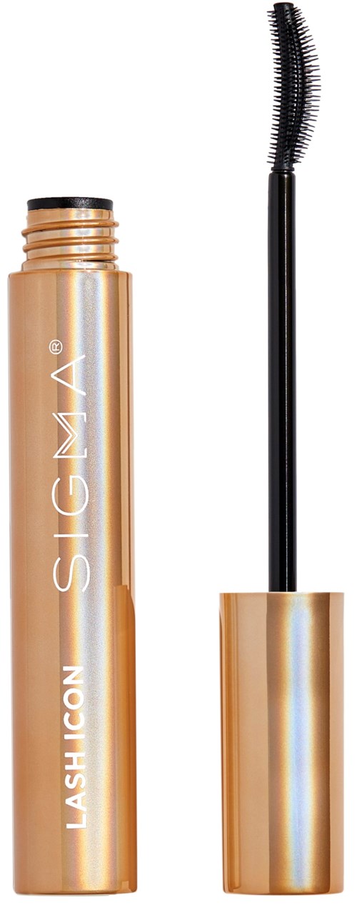 A mascara tube with the wand removed, showing the brush and gold-colored container.