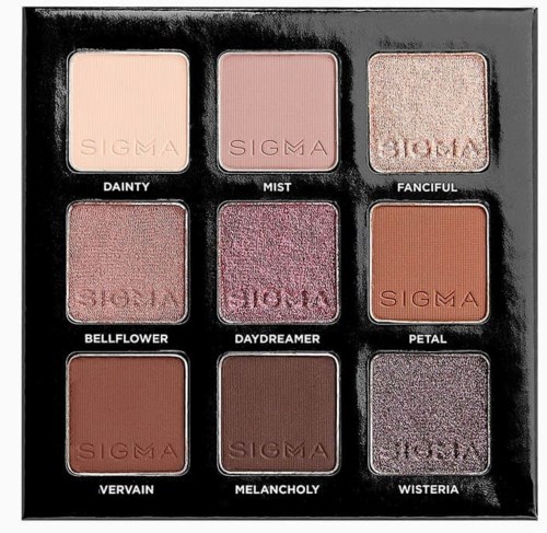 Palette with nine eyeshadows in various shades, labeled Dainty, Mist, Fanciful, Bellflower, Daydreamer, Petal, Vervain, Melancholy, Wisteria.