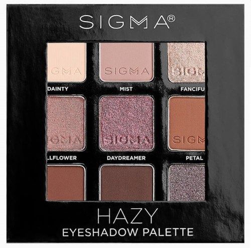 An eyeshadow palette with nine shades, including pink, purple, orange, and brown, in a black box.