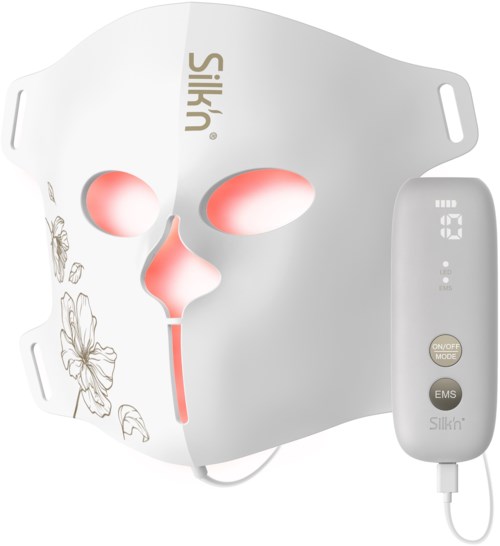Weißer Gesichtsmaske mit Augen und Nasenlöchern, Blumenmuster an der Seite, und ein verbundenes Gerät mit Steuerung.