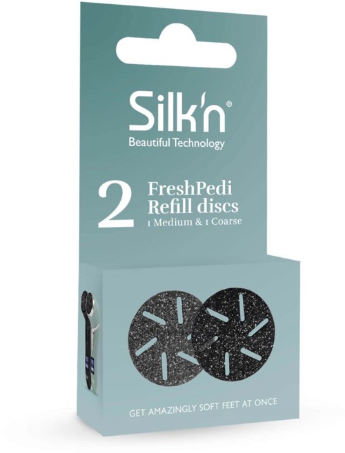 Eine Box mit zwei schwarzen, runden Nachfüllscheiben, gekennzeichnet mit 'Silk'n FreshPedi' für weiche Füße.