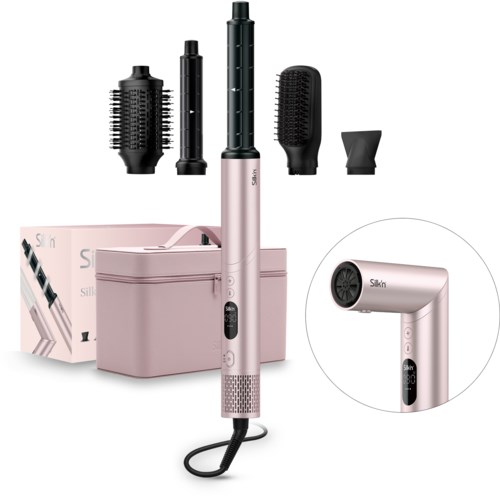 A pink hair styling kit includes a curling wand, various brush attachments, a storage box, and a small device.
